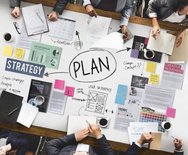 Strategy planning documents and sticky notes